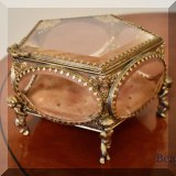 D28. Brass and glass display box.  